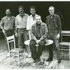 Ted Mann (seated on table) with technical crew of the stage production Romeo and Juliet