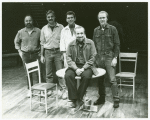 Ted Mann (seated on table) with technical crew of the stage production Romeo and Juliet