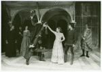 Paul Rudd (in mask), Pamela Payton-Wright, and Armand Assante in the stage production Romeo and Juliet