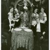 Philip Bosco (seated), Valerie Mahaffey (standing at center), Stephen Collins (seated) and others in the stage production The Loves of Anatol