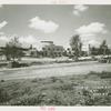 Administration Building - Construction - Looking NW with people and trees