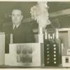 Aetna Exhibit - Miniature house on fire with man looking on