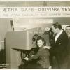 Aetna Exhibit - Glarometer with woman driving