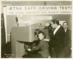 Aetna Exhibit - Glarometer with woman driving