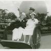American Express Participation - Couple on cart