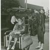 American Express Participation - Woman on cart in rain