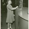 American Telephone & Telegraph Exhibit - Girl at display