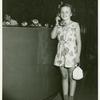 American Telephone & Telegraph Exhibit - Girl standing holding phone