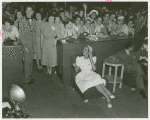 American Telephone & Telegraph Exhibit - Woman on phone with crowd behind