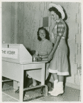 American Telephone & Telegraph Exhibit - Dimple Causey (Miss Houston) at the Voder