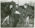 Amusements - American Jubilee - Performers - Man and women sitting on stage