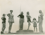 Amusements - American Jubilee - Performers - Chorus girls pose in front of Trylon