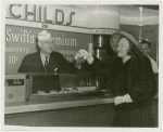 Amusements - American Jubilee - Performers - Monroe, Lucy - Getting hotdog