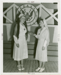 Amusements - American Jubilee - Performers - Wynn, Murray - Giving money to Red Cross
