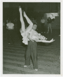 Amusements - American Jubilee - Scenes - Man holding woman