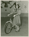 Amusements - American Jubilee - Scenes - Bicycle Number - Tina Regat with bicycle
