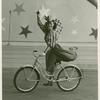 Amusements - American Jubilee - Scenes - Bicycle Number - Tina Regat on bicycle
