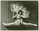 Amusements - Dance - Girl doing split with fan