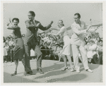 Amusements - Dance - Arthur Murray dancers demonstrating "Boomps-a-Daisy"
