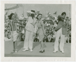 Amusements - Dance - Arthur Murray dancers demonstrating "Boomps-a-Daisy"