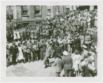 Amusements - Dance - Man dancing in street with band and audience