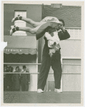 Amusements - Dance - Man spinning dance partner in air