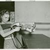 Amusements - Games and Rides - Woman shooting tommy gun