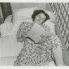 Amusements - Games and Rides - De-Bunk-Her - Girl reading in bed