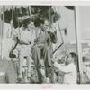 Amusements - Games and Rides - Parachute Jump - Rathbone couple with Parachute Jump employee