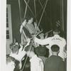 Amusements - Games and Rides - Parachute Jump - Two women suspended on jammed ride