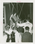 Amusements - Games and Rides - Parachute Jump - Two women suspended on jammed ride