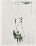 Amusements - Games and Rides - Parachute Jump - Man and woman married on ride