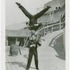 Amusements - Midway Activities - Two acrobats playing instruments