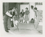 Amusements - Midway Activities - Man and woman in joke photography studio