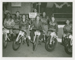 Amusements - Midway Activities - Barkers - Harold "Wandering" Smith with men and women on bikes