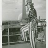 Amusements - Midway Activities - Uncle Sam - On roof, Perisphere and Trylon in background