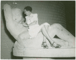 Amusements - Performers and Personalities - Irene Castle on statue at Brazil Pavilion