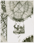 Amusements - Performers and Personalities - Jimmie Ellison and wife riding Parachute Jump