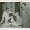 Amusements - Performers and Personalities - Bergen, Edgar - Signing guestbook with Charlie McCarthy, Fiorello LaGuardia and Grover Whalen