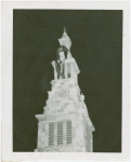 Amusements - Performers and Personalities - Bradshaw, Russell - Atop Church of Christ Tower helped by firemen