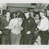 Amusements - Performers and Personalities - Bradshaw, Russell - Under arrest with policemen