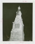 Amusements - Performers and Personalities - Bradshaw, Russell - Atop Church of Christ Tower helped by firemen
