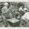 Amusements - Performers and Personalities - Fairbanks, Douglas Sr. and Jr. - Douglas Fairbanks Jr. eating with Frank Buck