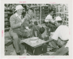 Amusements - Performers and Personalities - Fairbanks, Douglas Sr. and Jr. - Douglas Fairbanks Jr. eating with Frank Buck