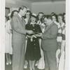 Amusements - Performers and Personalities - Fairbanks, Douglas Sr. and Jr. - Douglas Fairbanks Jr. selling ticket to Fiorello LaGuardia