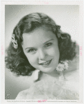 Amusements - Performers and Personalities - Jean, Gloria - With daisies