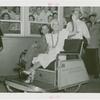 Amusements - Performers and Personalities - Lamour, Dorothy - In American Express pushcart