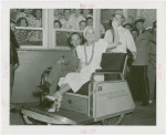 Amusements - Performers and Personalities - Lamour, Dorothy - In American Express pushcart