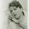 Amusements - Performers and Personalities - Lee, Gypsy Rose - On sofa