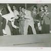 Amusements - Performers and Personalities - Musicians - Louis Prima playing trumpet for dancers
